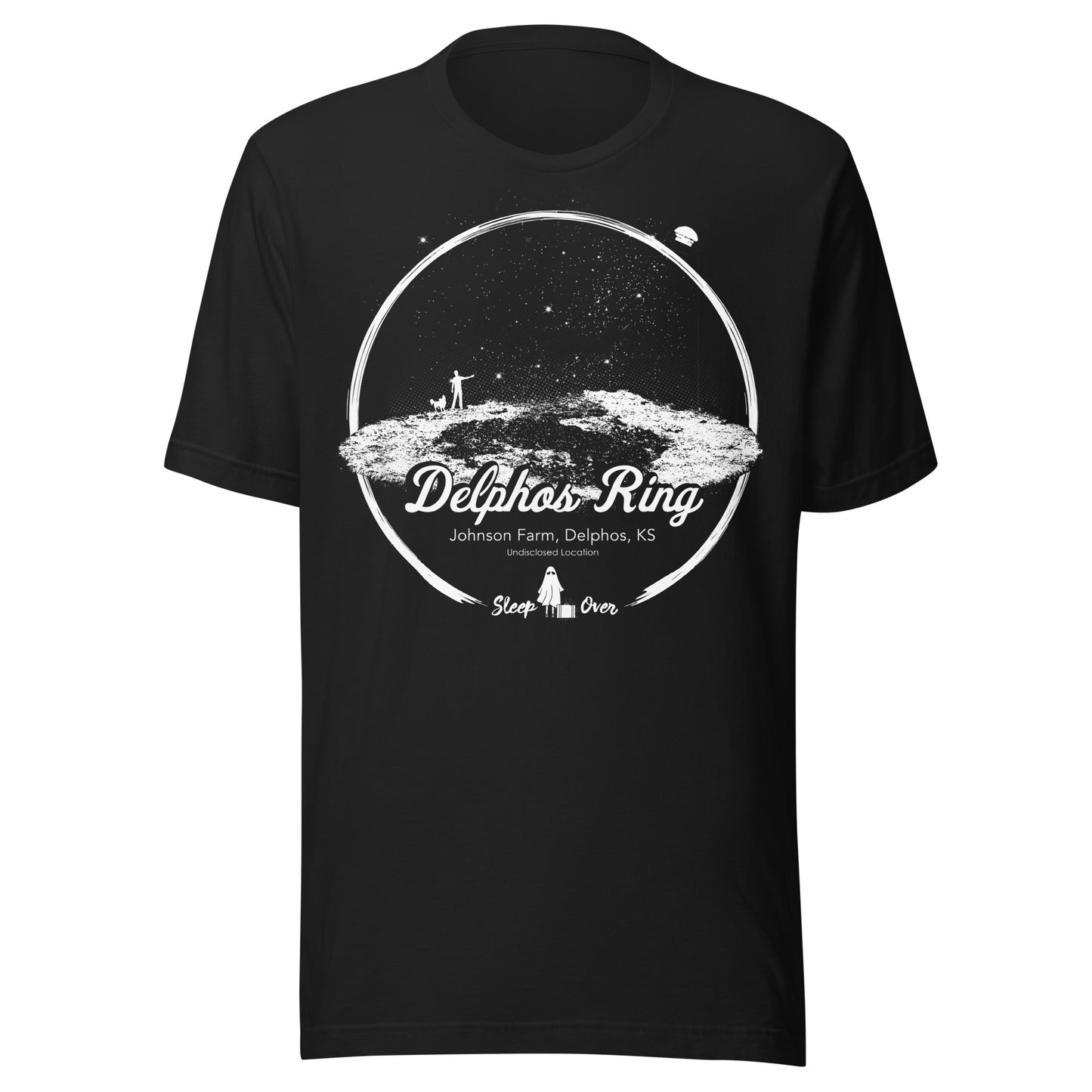 Black T-shirt featuring a white illustration of the Delphos Ring—an alleged UFO landing site on Johnson Farm in Delphos, Kansas—set beneath a starlit sky with figure and dog silhouettes. Text includes “Undisclosed Location” and “Sleep Over” branding.