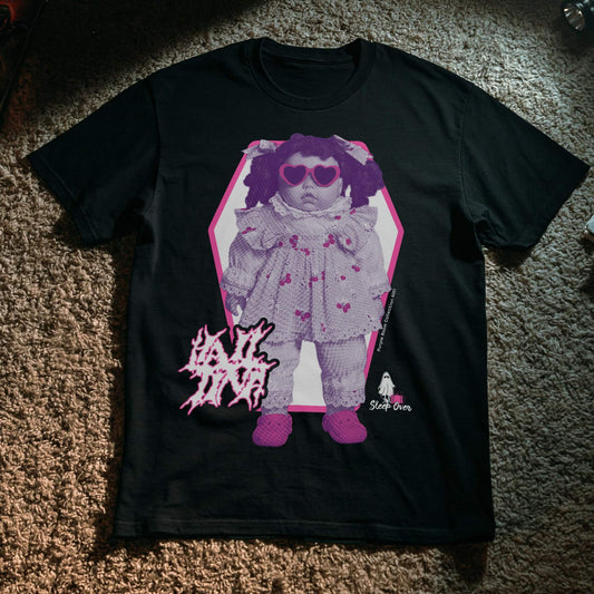 Hail Tina, a haunted doll graphic t-shirt from the SleepOver Purple Room Collection.