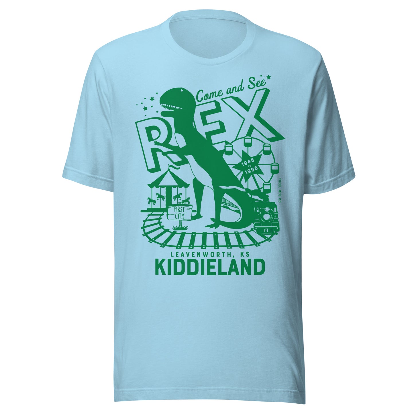 T-shirt featuring a retro green graphic of a dinosaur named Rex, a Ferris wheel, train tracks, and the text “Come and See Rex – Kiddieland – Leavenworth, KS – 1948–1998.”
