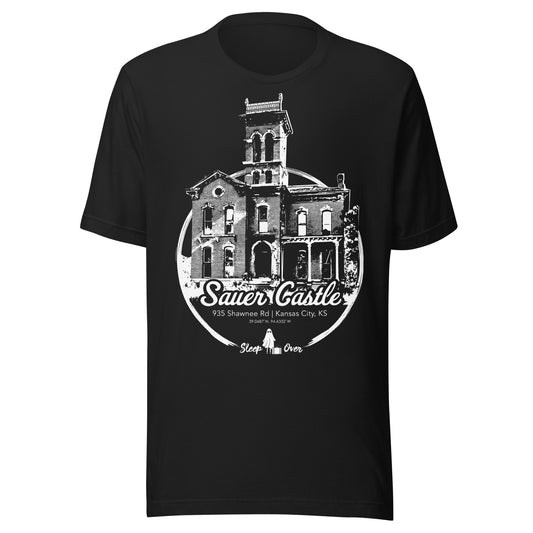 Black T-shirt with a white illustration of Sauer Castle, a historic and reportedly haunted mansion located in Kansas City, Kansas. Includes coordinates and Sleep Over branding with a small ghost icon.